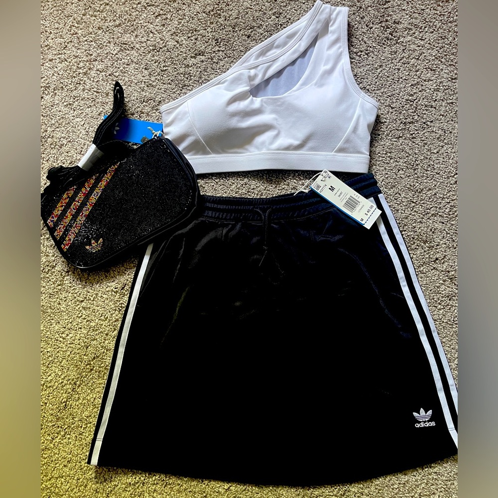 Brand new women’s Adidas skirt, size Medium. Tags still on